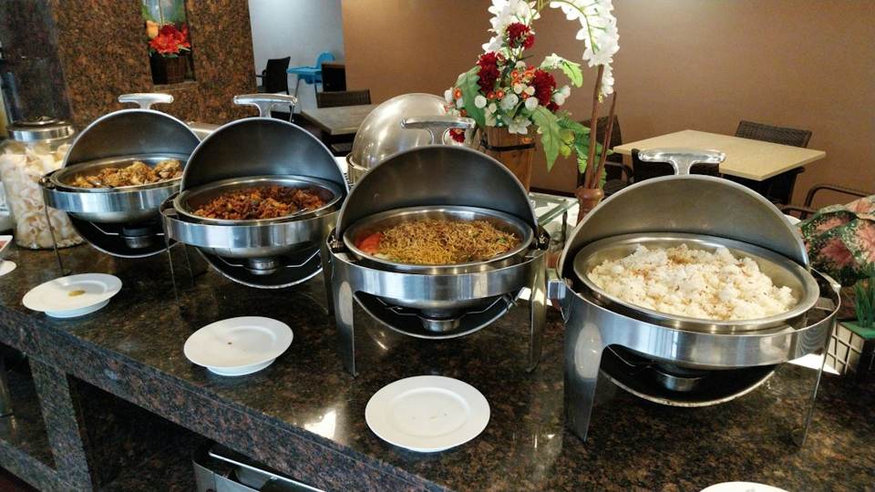 A hotel buffet with chafing dishes