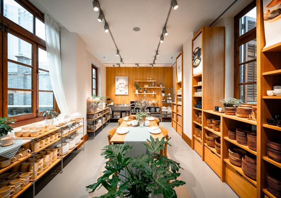 A homeware shop with wooden shelves