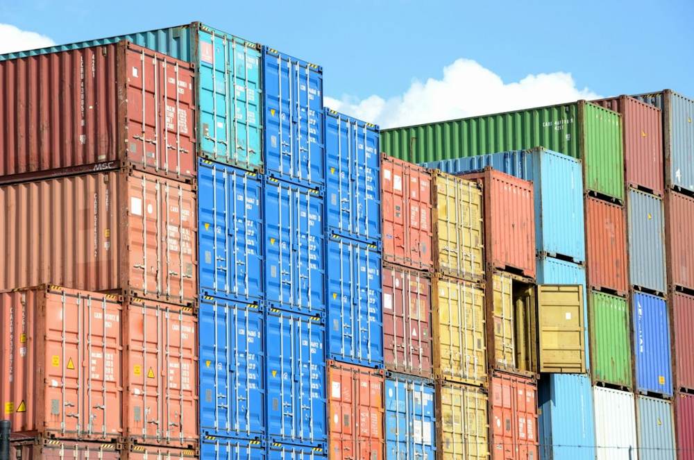 Stacked shipping containers in bright colours