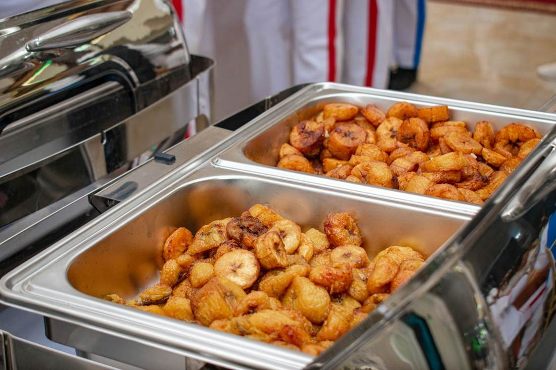 Stainless steel chafing dishes on a buffet